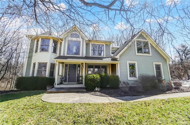 view of front of property with a front lawn