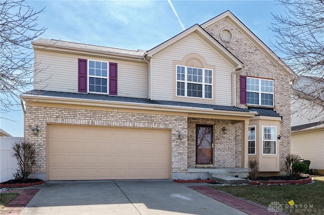 view of front of property featuring concrete driveway, a garage, and brick siding