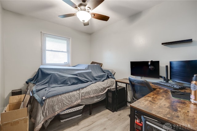 bedroom featuring a ceiling fan and light wood-style floors