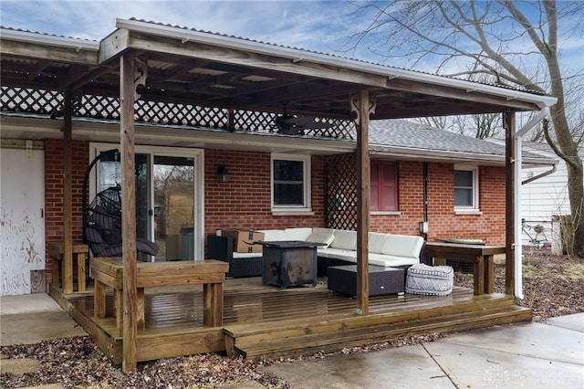 wooden deck with outdoor lounge area