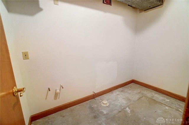 interior space featuring baseboards