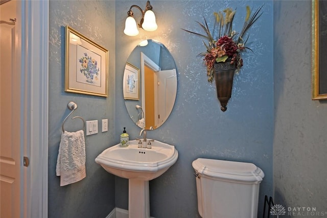 bathroom featuring toilet