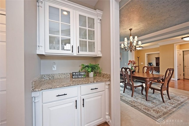 dining space featuring a chandelier