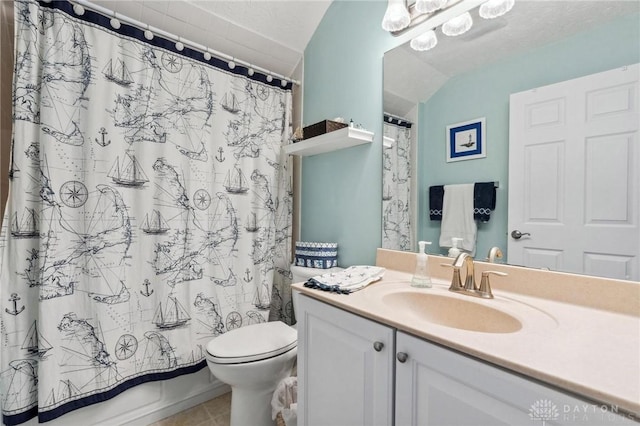 bathroom featuring toilet, tile patterned flooring, shower / bath combination with curtain, vanity, and vaulted ceiling