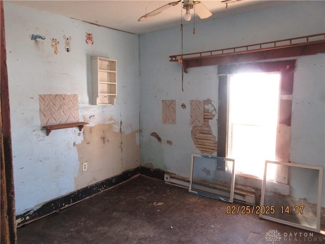 unfurnished room with ceiling fan