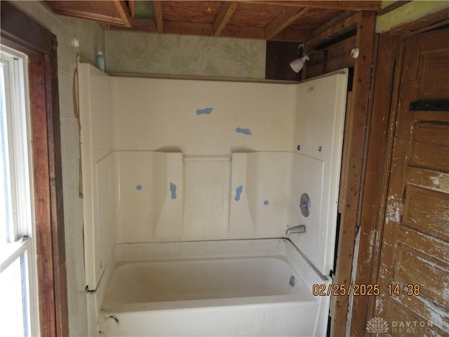 full bathroom featuring a tub to relax in and walk in shower