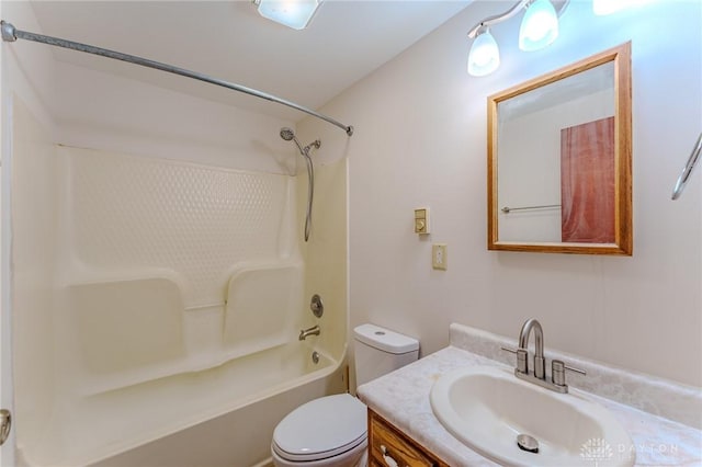 full bath with toilet,  shower combination, and vanity