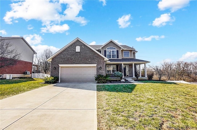 view of front of house featuring a front lawn, driveway, a porch, fence, and brick siding