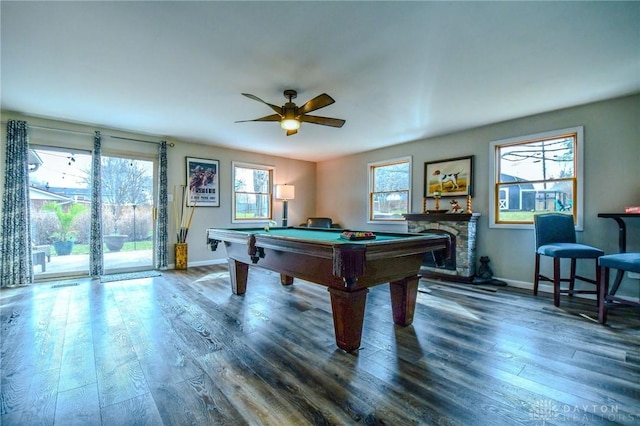 playroom featuring plenty of natural light, wood finished floors, and pool table