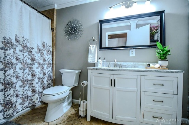 bathroom featuring tile patterned flooring, crown molding, baseboards, toilet, and vanity