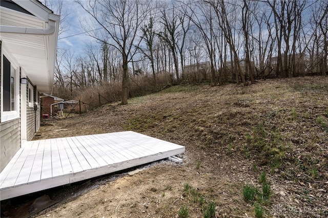 view of yard featuring a wooden deck