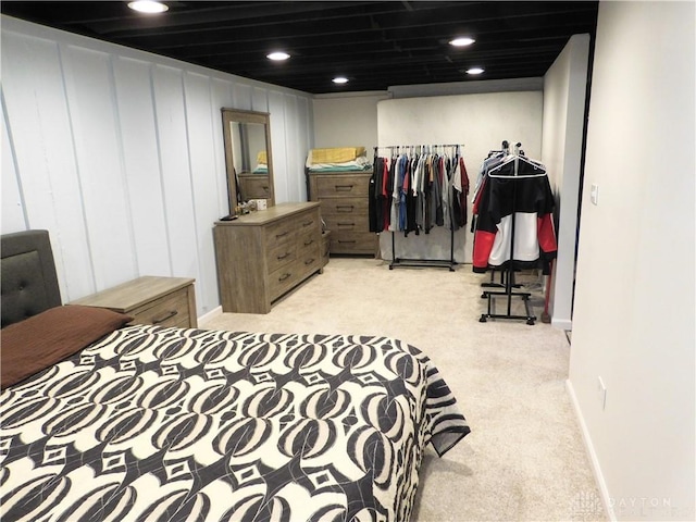 bedroom featuring recessed lighting, baseboards, and light carpet