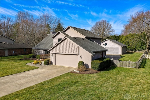 view of property exterior with a lawn, driveway, fence, an attached garage, and a chimney