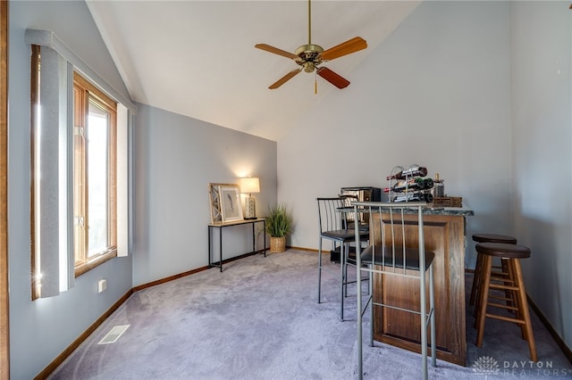 office with baseboards, visible vents, a wealth of natural light, and ceiling fan