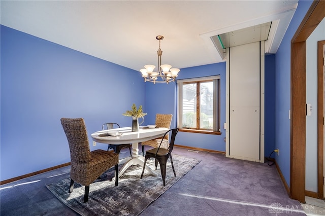 dining space with carpet, baseboards, and a chandelier