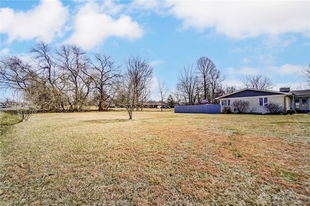 view of yard featuring fence