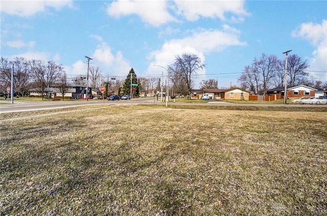 view of yard with a residential view