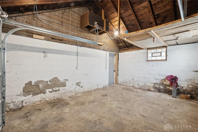 garage featuring concrete block wall