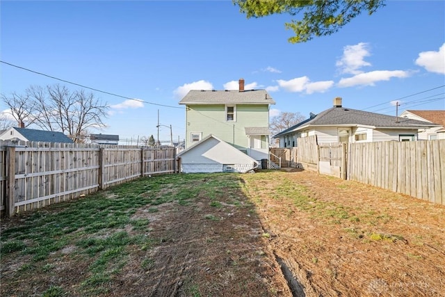 view of yard featuring a fenced backyard