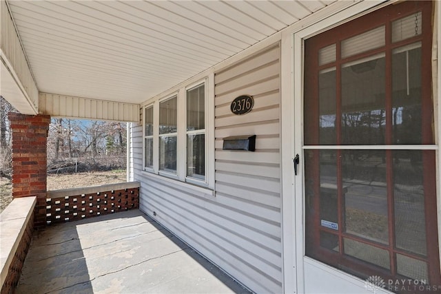 view of patio featuring a porch