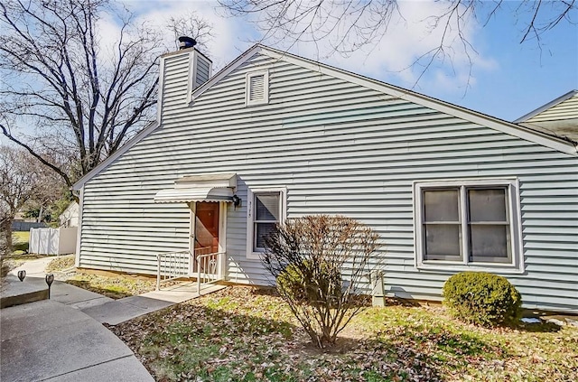 view of front of property with a chimney