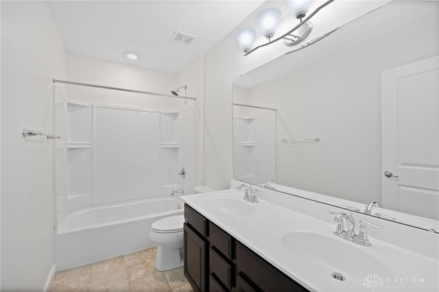 full bath featuring double vanity, toilet, bathtub / shower combination, and a sink