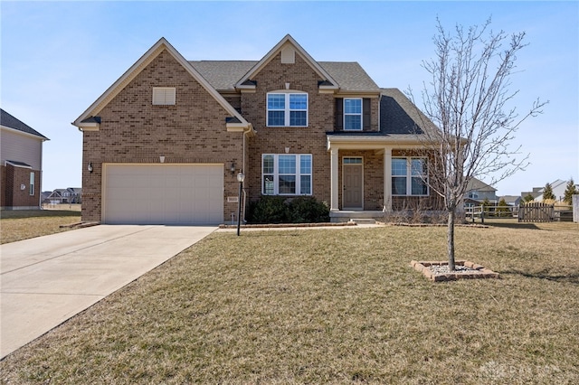 traditional home featuring brick siding, a front lawn, fence, a garage, and driveway