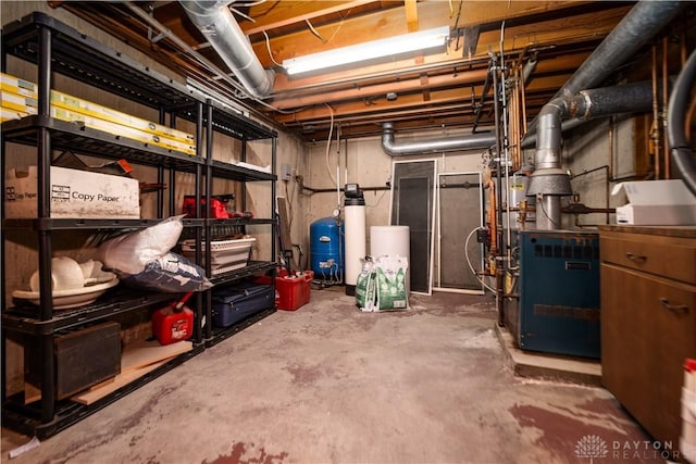 unfinished basement with a heating unit