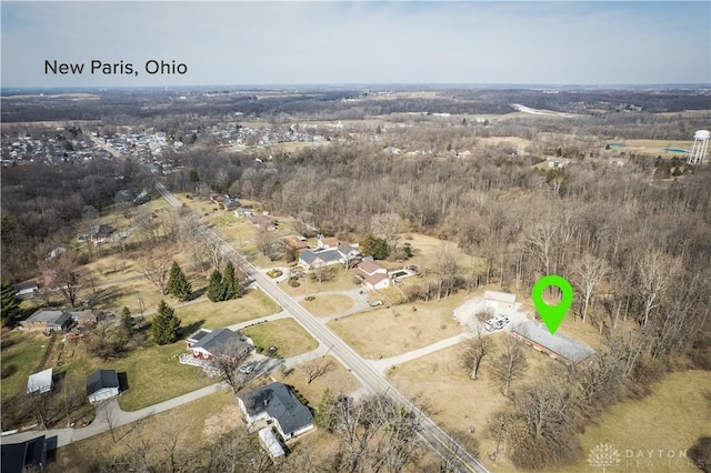 birds eye view of property with a rural view