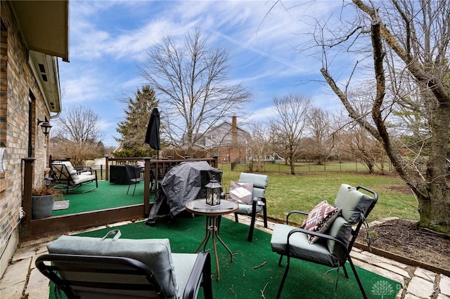 view of patio with a wooden deck and outdoor lounge area