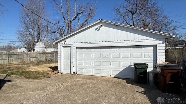 detached garage with fence