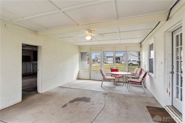 6384 Heffner Rd, Tipp City, OH 45371 - sunroom featuring concrete floors, a ceiling fan, and plenty of natural light