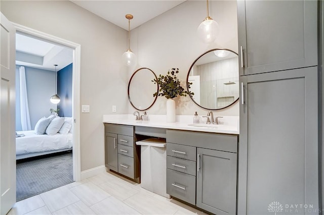 1002 Belfast Dr, Sugarcreek Township, OH 45440 - full bathroom featuring double vanity, tiled shower, ensuite bath, and a sink