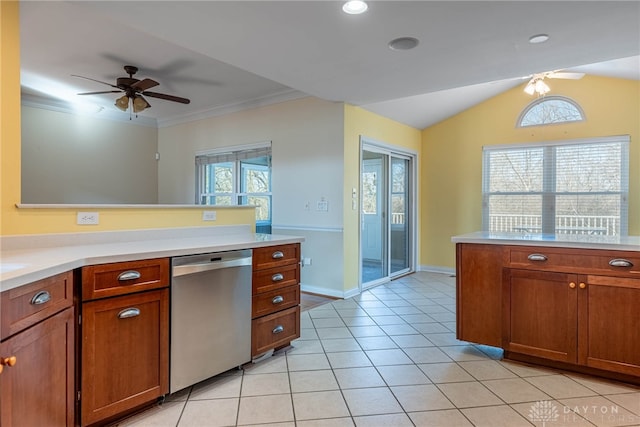 kitchen with dishwasher, light countertops, brown cabinets, and ceiling fan