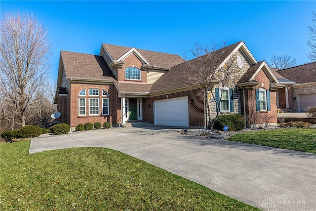 traditional-style house featuring driveway, a front lawn, stone siding, an attached garage, and brick siding