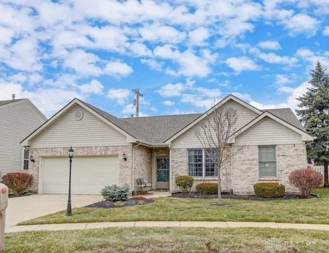 ranch-style home featuring brick siding, driveway, a front lawn, and a garage