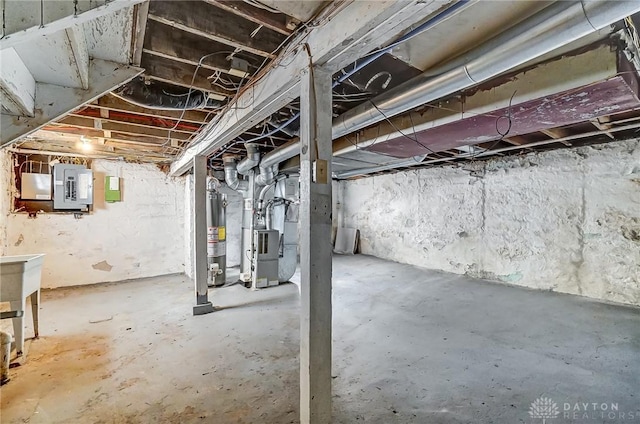 252 Illinois Ave, Dayton, OH 45410 - unfinished basement featuring electric panel, heating unit, and water heater