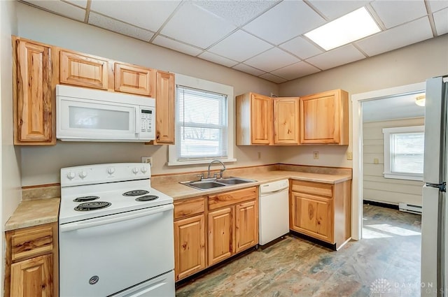 252 Illinois Ave, Dayton, OH 45410 - kitchen with white appliances, a sink, baseboard heating, light countertops, and a drop ceiling