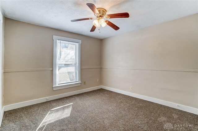 252 Illinois Ave, Dayton, OH 45410 - carpeted empty room featuring baseboards and a ceiling fan