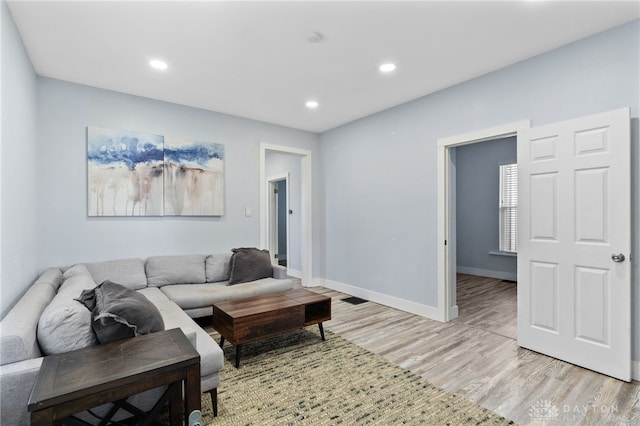 331 Morton Ave, Dayton, OH 45410 - living room featuring light wood-style flooring, baseboards, and recessed lighting
