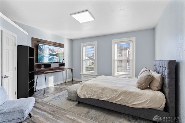 331 Morton Ave, Dayton, OH 45410 - bedroom with baseboards and wood finished floors