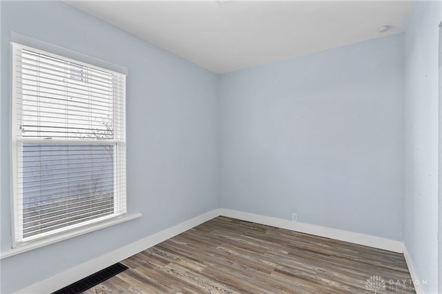 331 Morton Ave, Dayton, OH 45410 - empty room featuring wood finished floors, baseboards, and visible vents
