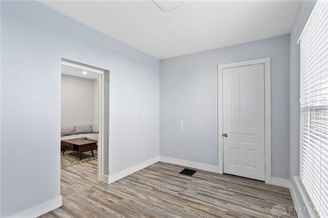 331 Morton Ave, Dayton, OH 45410 - unfurnished room with wood finished floors and baseboards