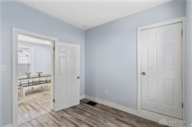 331 Morton Ave, Dayton, OH 45410 - unfurnished bedroom featuring wood finished floors and baseboards