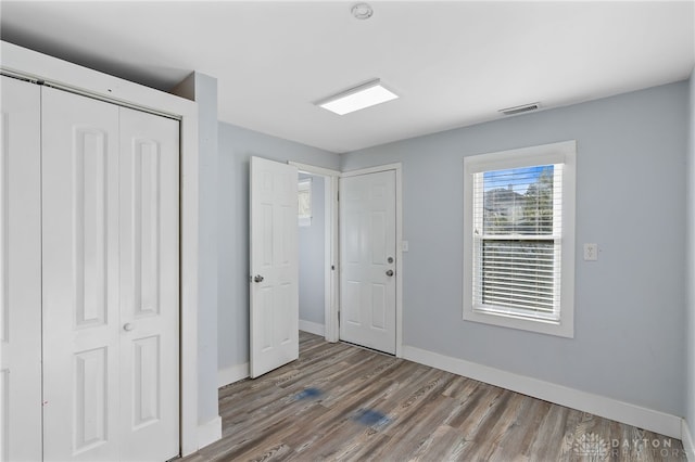 331 Morton Ave, Dayton, OH 45410 - foyer with wood finished floors, baseboards, and visible vents