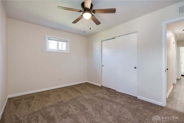 5027 Hackett Dr, Dayton, OH 45417 - unfurnished bedroom with carpet flooring and baseboards