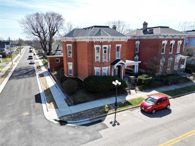 exterior space featuring uncovered parking