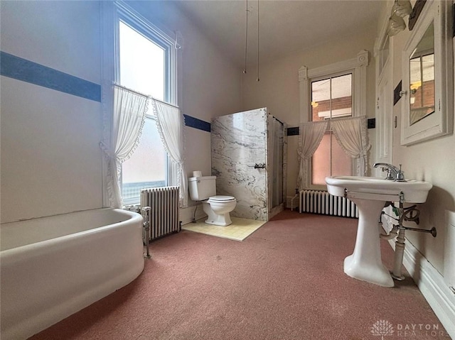 full bath featuring toilet, radiator heating unit, and a towering ceiling