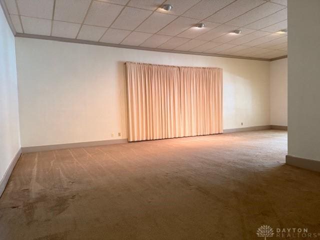 2 County Line Rd, College Corner, OH 45003 - spare room featuring a paneled ceiling, baseboards, ornamental molding, and carpet flooring