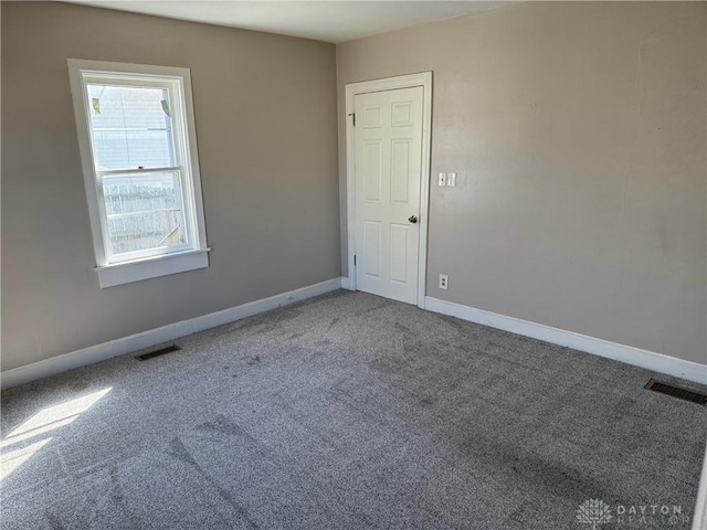 2 County Line Rd, College Corner, OH 45003 - carpeted empty room with visible vents and baseboards